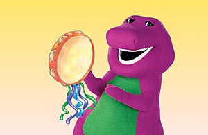 Barney plays the tambourine