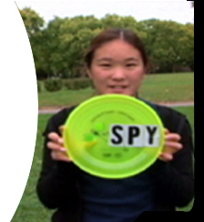 girl holding flying disk