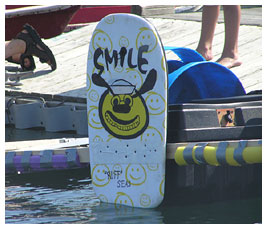 Ruff's face painted on a boogie board.