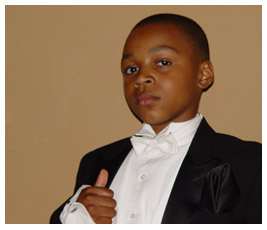 Khalil wearing a tuxedo.