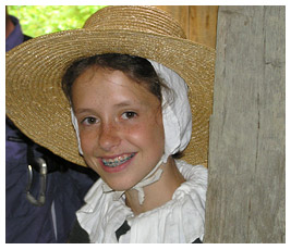 Anna in straw hat.