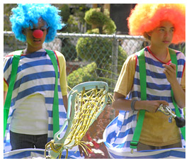 Noah and Taylor in clown costumes.