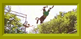 Madi swings on a trapeze.