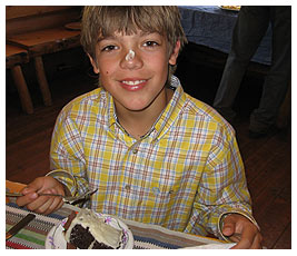 Willie with birthday cake icing on his nose.