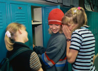 Girls whispering