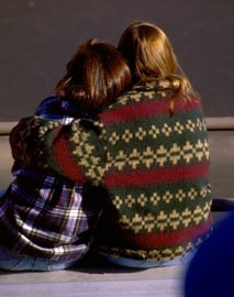 Woman hugging child