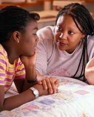 Mother talking to daughter