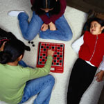 Girls playing checkers