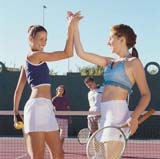 Girls playing tennis