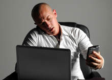 Photo of the man with lots of tech devices