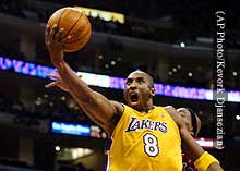 A photo of Kobe Bryant scoring another two points
