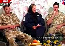 A still from a video showing the captured British sailors