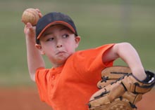 Photo of boy playing baseball