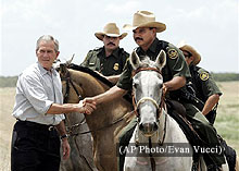 President Bush shakes hands with some mounted Border Patrol agents