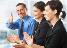 Photo of a colleagues applauding