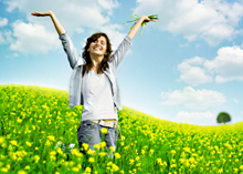 Photo of happy woman in a field