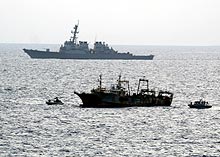 Photo of US Navy securing waters from pirates.