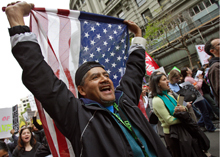 Photo of an immigrant protesting proposed reforms