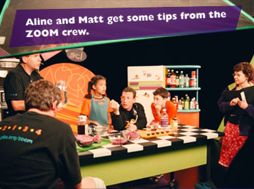 Aline and Matt get some tips from the ZOOM crew