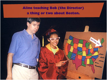 Aline teaching Bob (the Director) a thing or two about Boston.