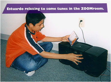 Estuardo relaxing to some tunes in the ZOOMroom.