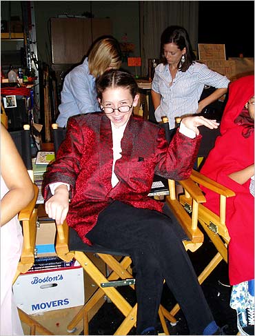 Cara plays it up to the camera off set.