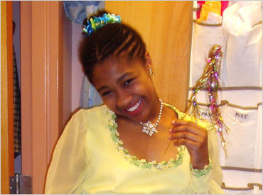 Make a wish! Fairy Godmother, Kortney, waves the magic wand.